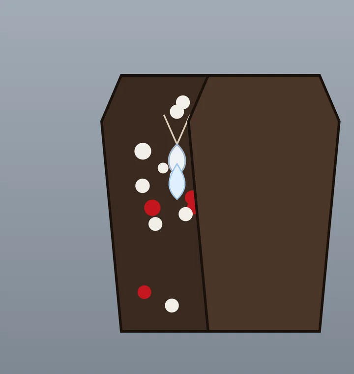A pendant dropping among the flowers in an open coffin as the lid slides shut