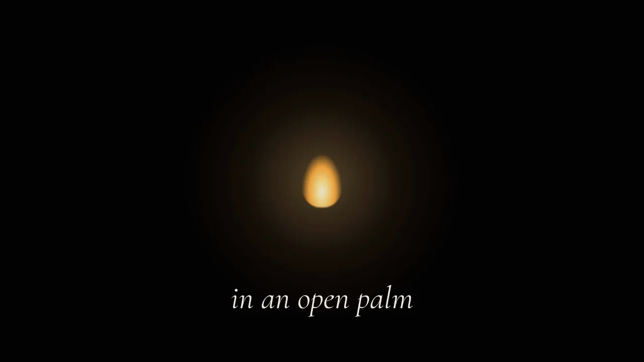 The flame resting in an open palm
